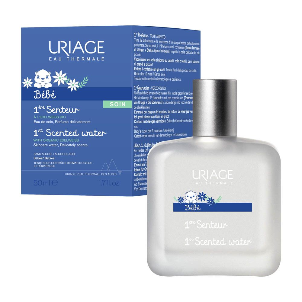 Kind met product. Uriage Bébé 1ère Senteur. Product wordt op hals gespoten. Zonder alcohol.