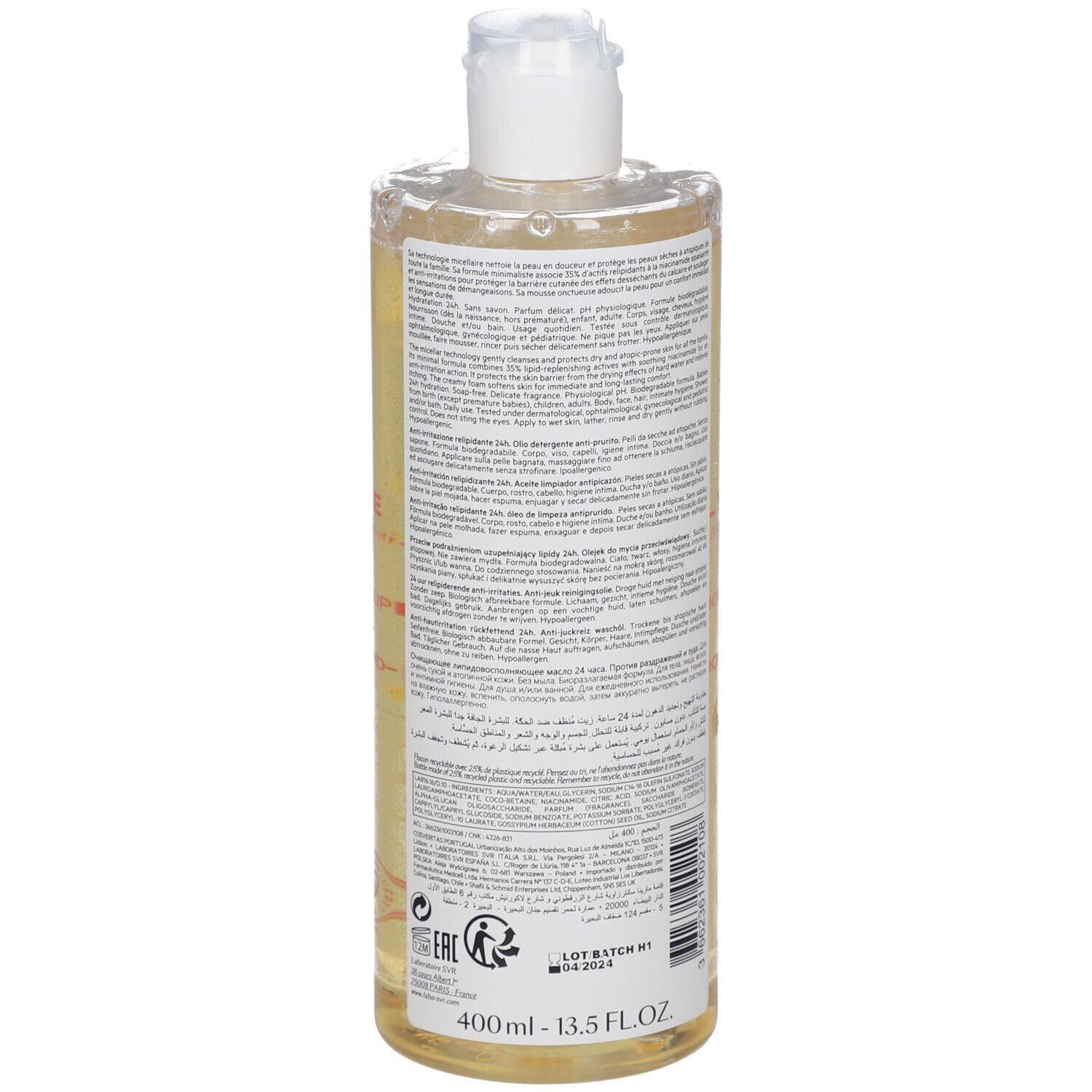 SVR Topialyse Mizellenreinigungsöl. Rückseite der Flasche mit Text. Transparente Flasche mit gelber Flüssigkeit.