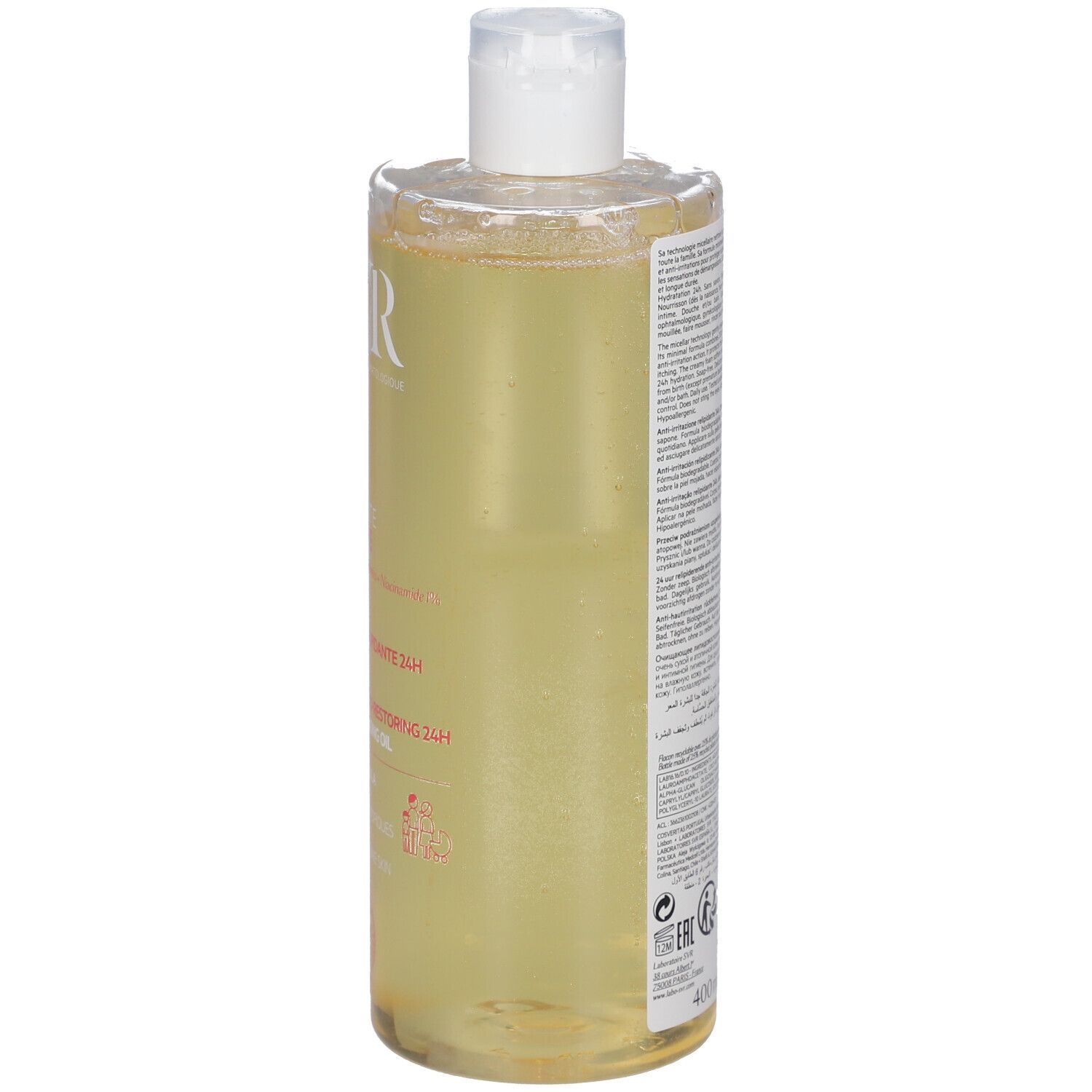 SVR Topialyse Mizellenreinigungsöl. Transparente Flasche mit gelber Flüssigkeit. Rückseite mit Text. Weißer Deckel.