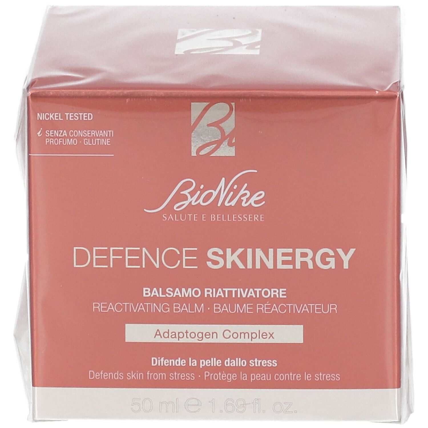 Vorderseite der BioNike DEFENCE SKINERGY Balsam-Verpackung. Rote Schachtel mit Produktnamen und Logo.