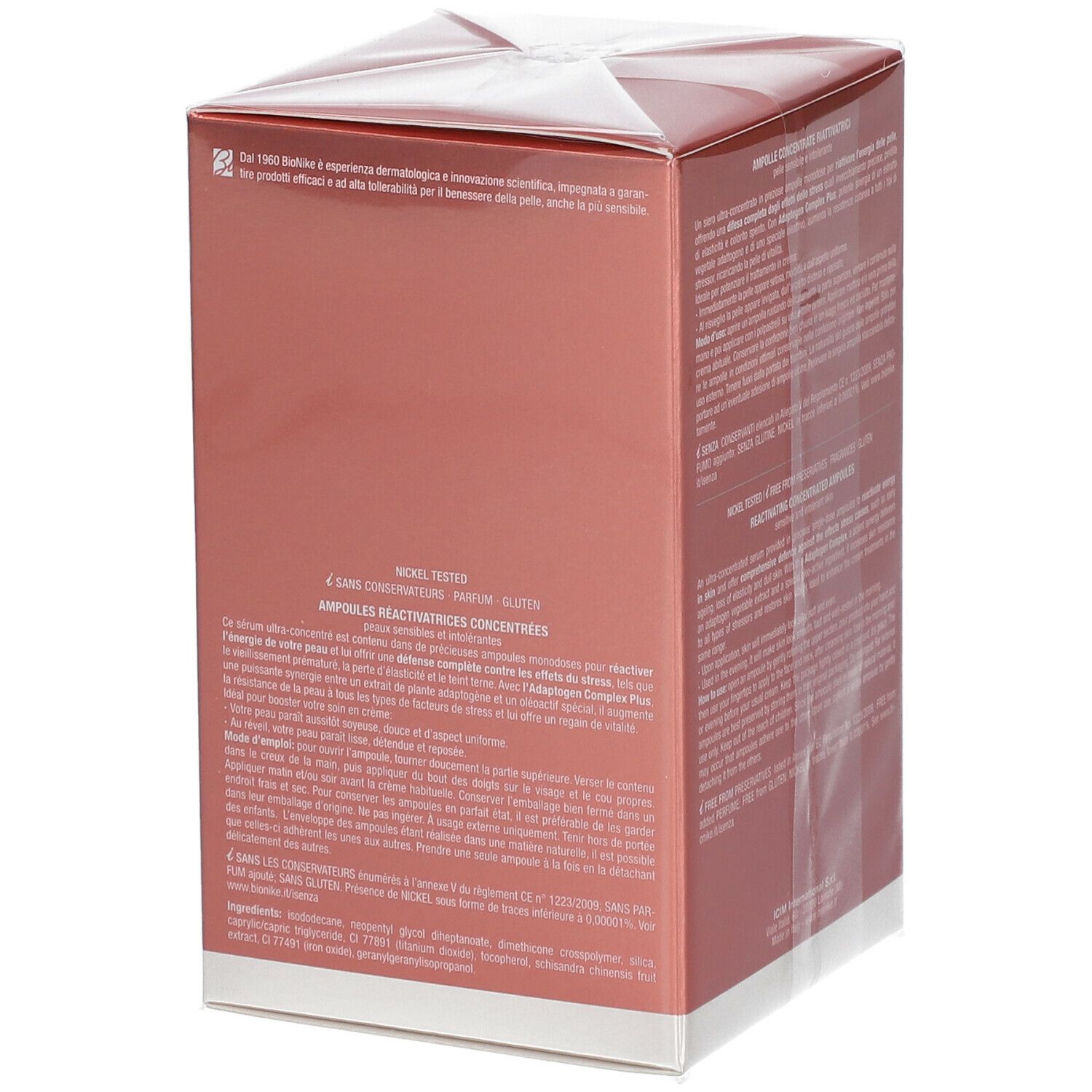 Boîte rose et blanche. Texte. Texte: DEFENCE SKINERGY. Dos avec texte.