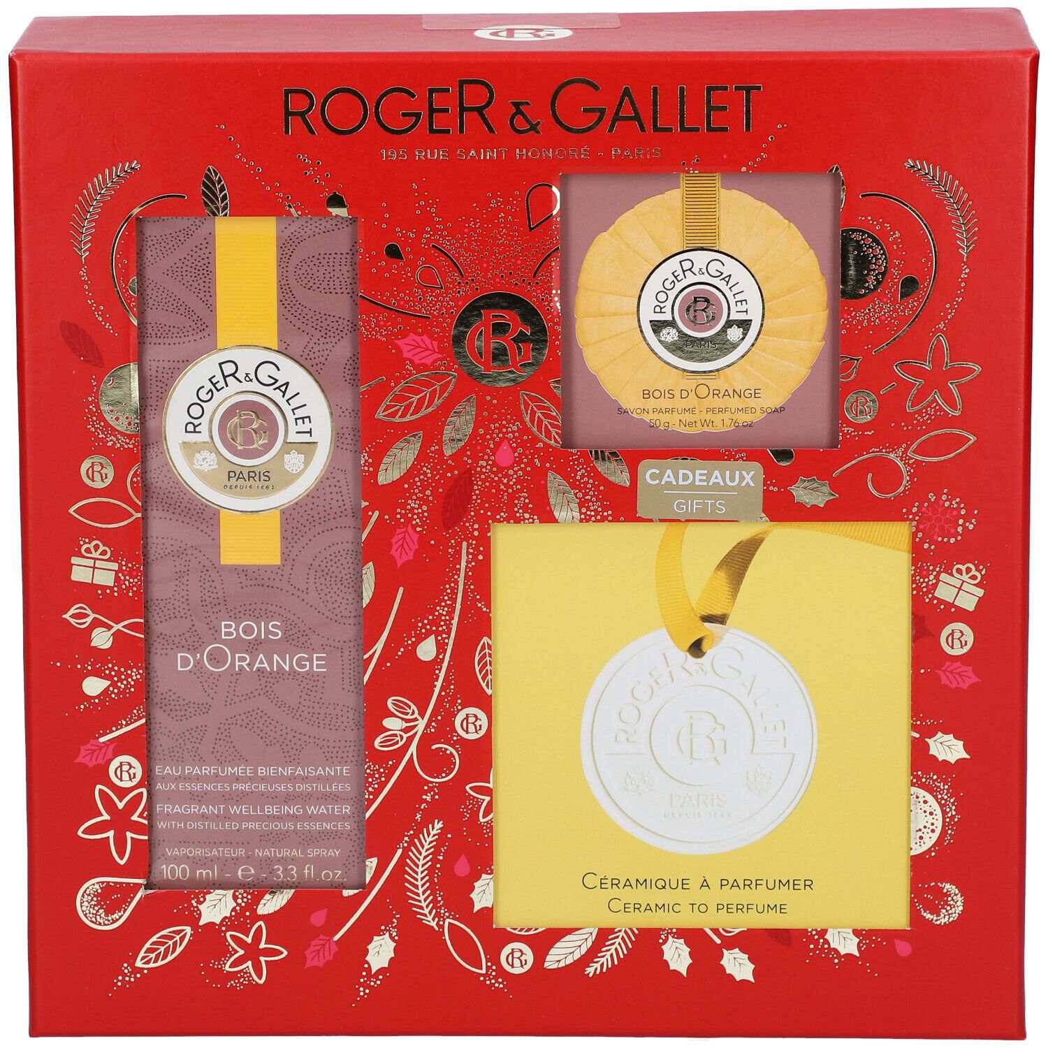 Rode geschenkverpakking Roger & Gallet Bois d'Orange. Bevat fles, zeep en keramiek hanger. Gouden decoratie.