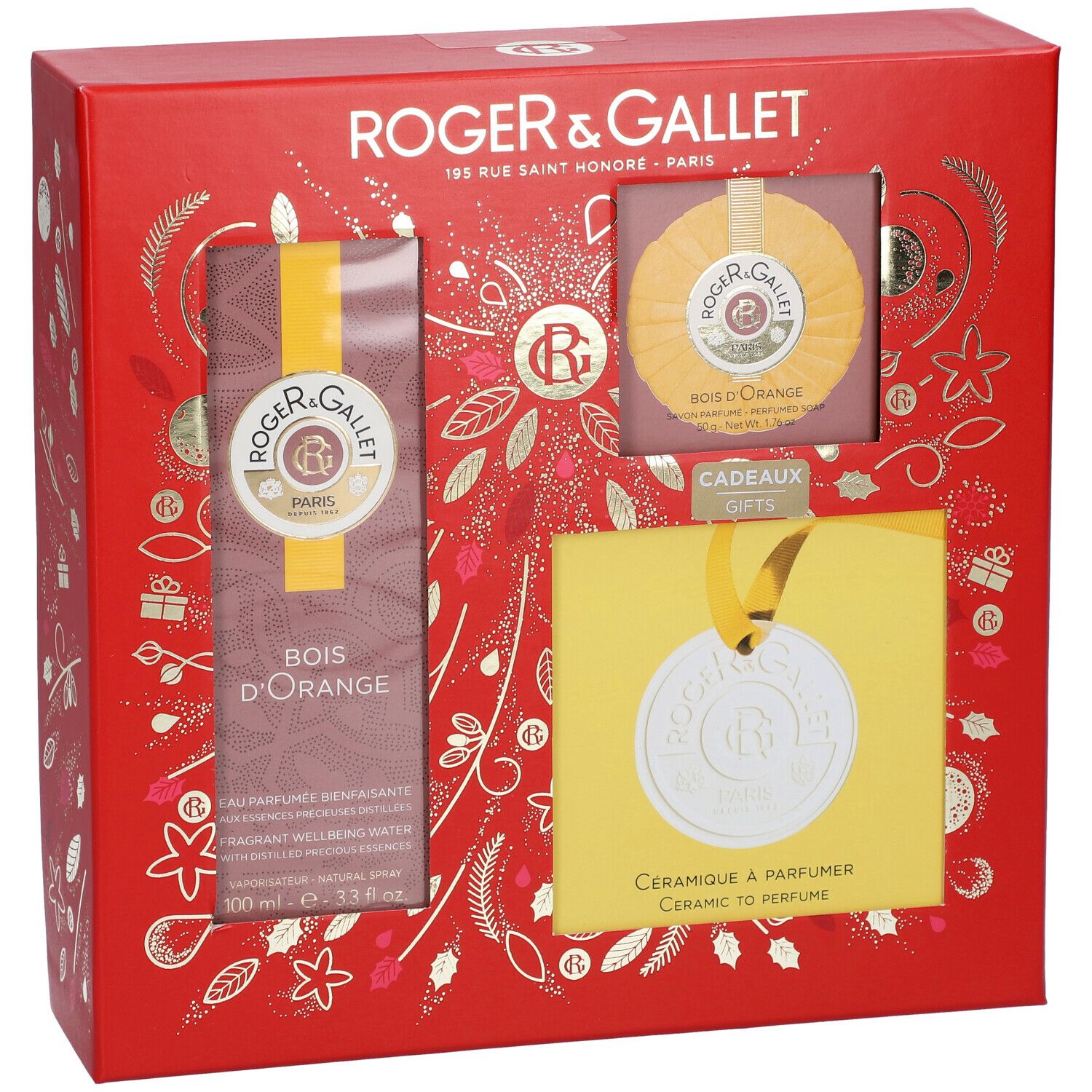Rode geschenkverpakking Roger & Gallet Bois d'Orange. Bevat fles, zeep en keramiek hanger. Gouden decoratie.
