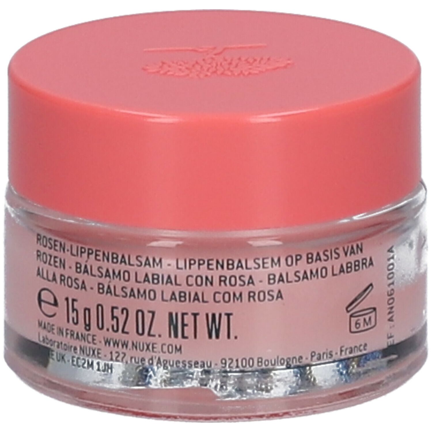 Nuxe Very Rose lippenbalsem. Roze potje met roze deksel. Tekst: Rozen-lippenbalsem. Nettogewicht 15g. Houdbaarheidssymbool. Tekst: www.nuxe.com.