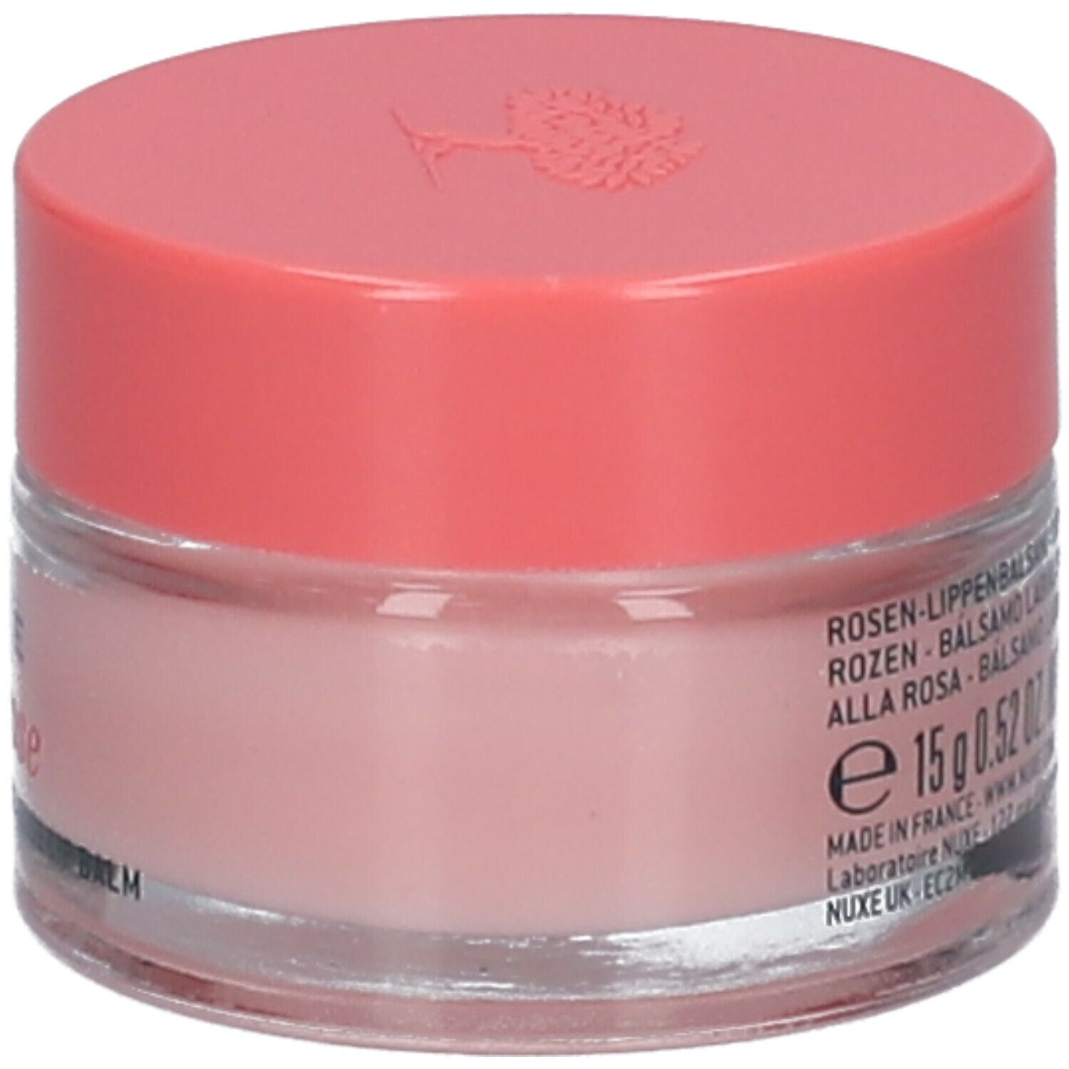 Nuxe Very Rose lippenbalsem. Roze potje met roze deksel. Tekst: Rozen-lippenbalsem. Nettogewicht 15g. Tekst: www.nuxe.com.