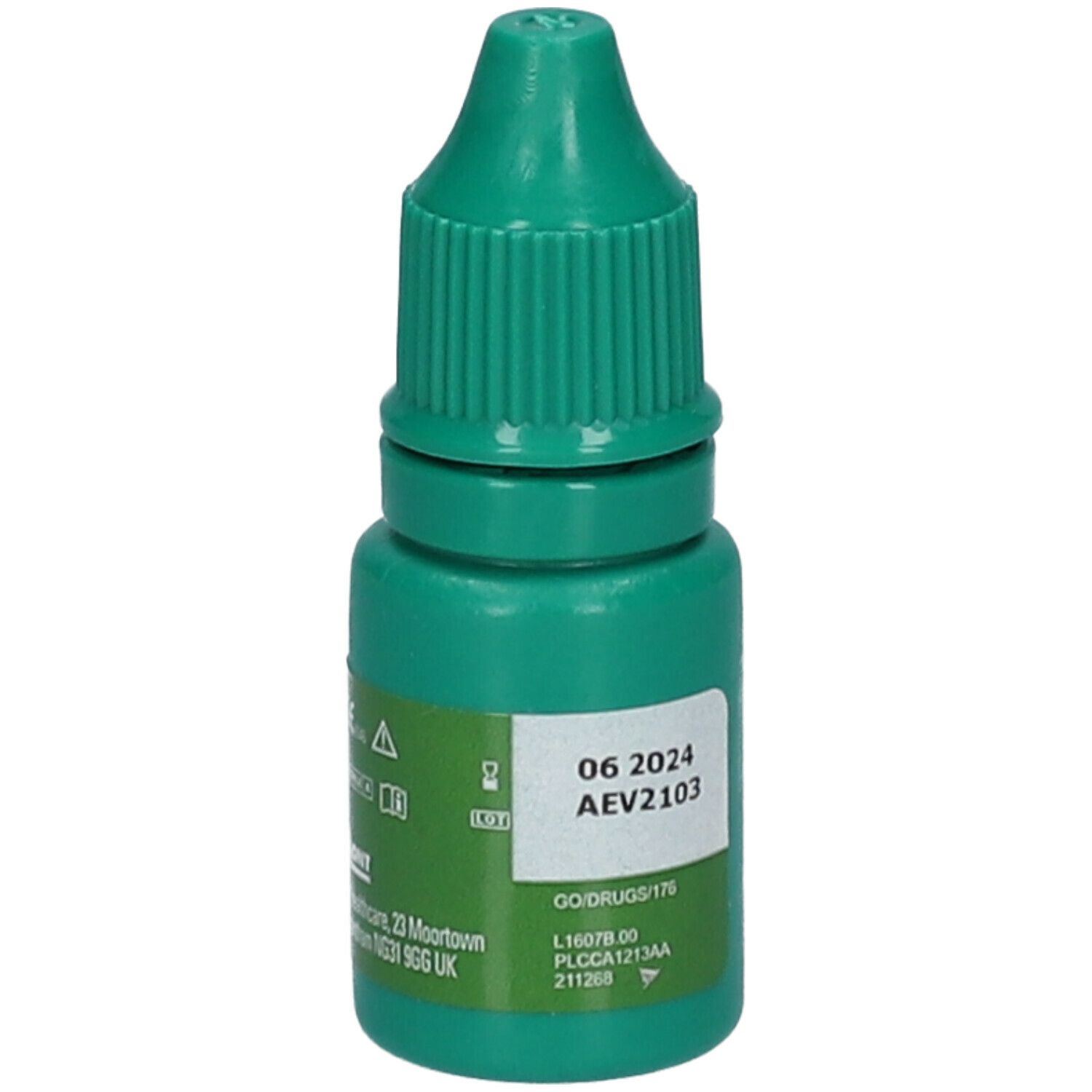 Groene oogdruppelfles met wit etiket. Opdruk: houdbaarheidsdatum en lotnummer. Groene schroefdop.