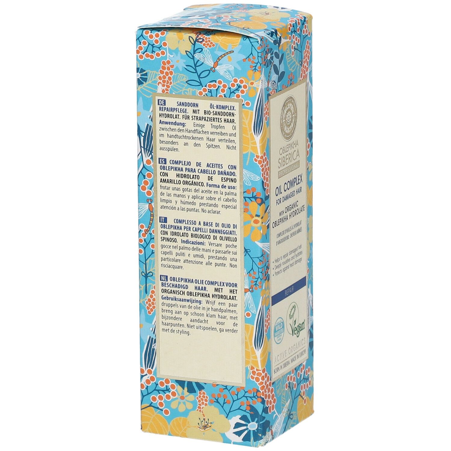 Rückseite der Kartonverpackung. Text in mehreren Sprachen. Floralmuster auf blauem Grund.