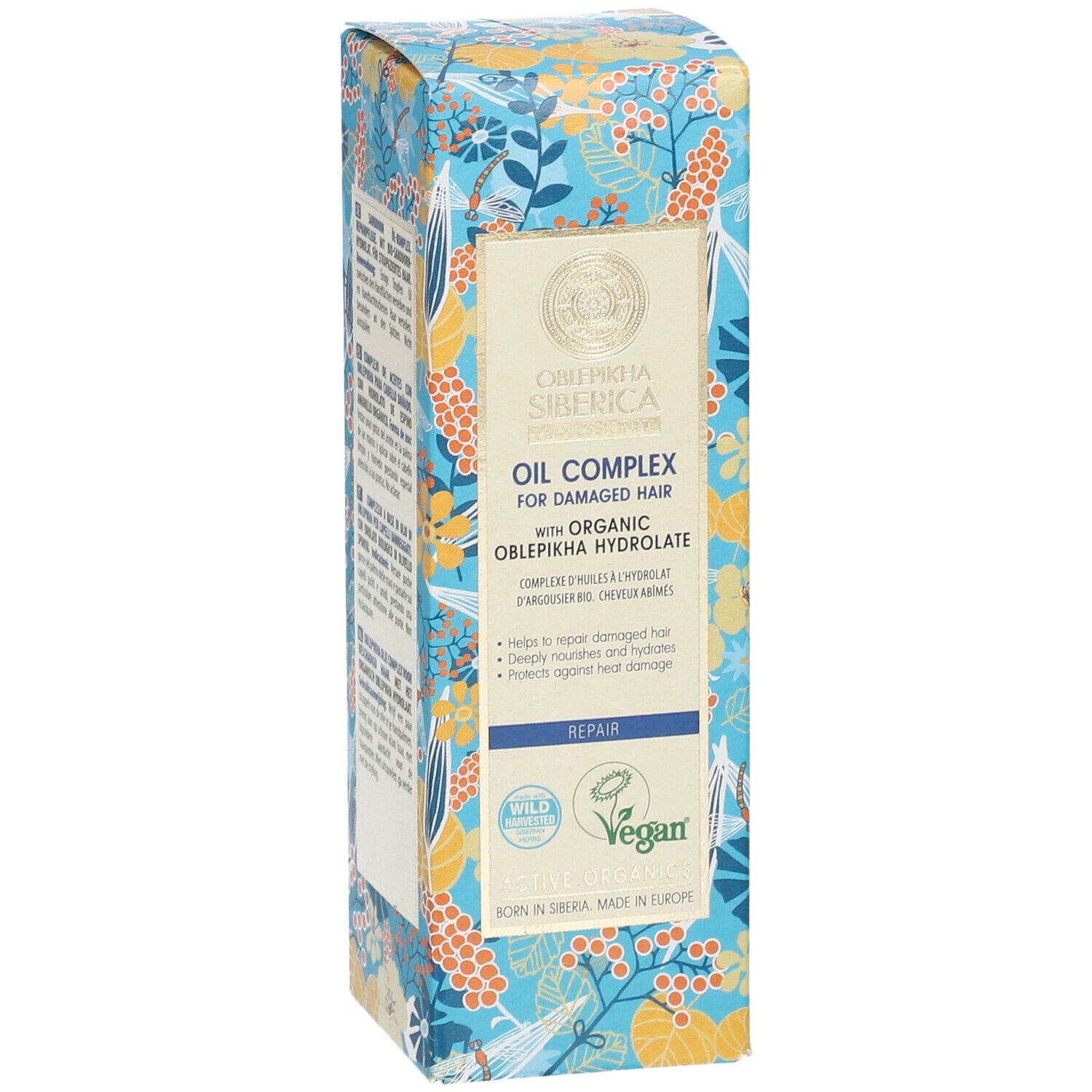 Vorderseite der Kartonverpackung. Produktname, Logo und Vegan-Siegel. Floralmuster.