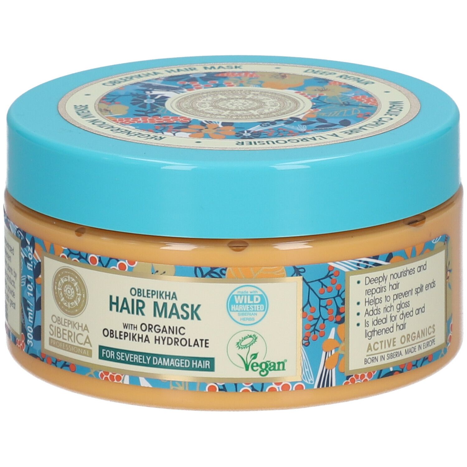 Haarmasker met blauw deksel. Opschrift: Oblepikha Hair Mask, voor zwaar beschadigd haar. Vegan-zegel. Tekst.
