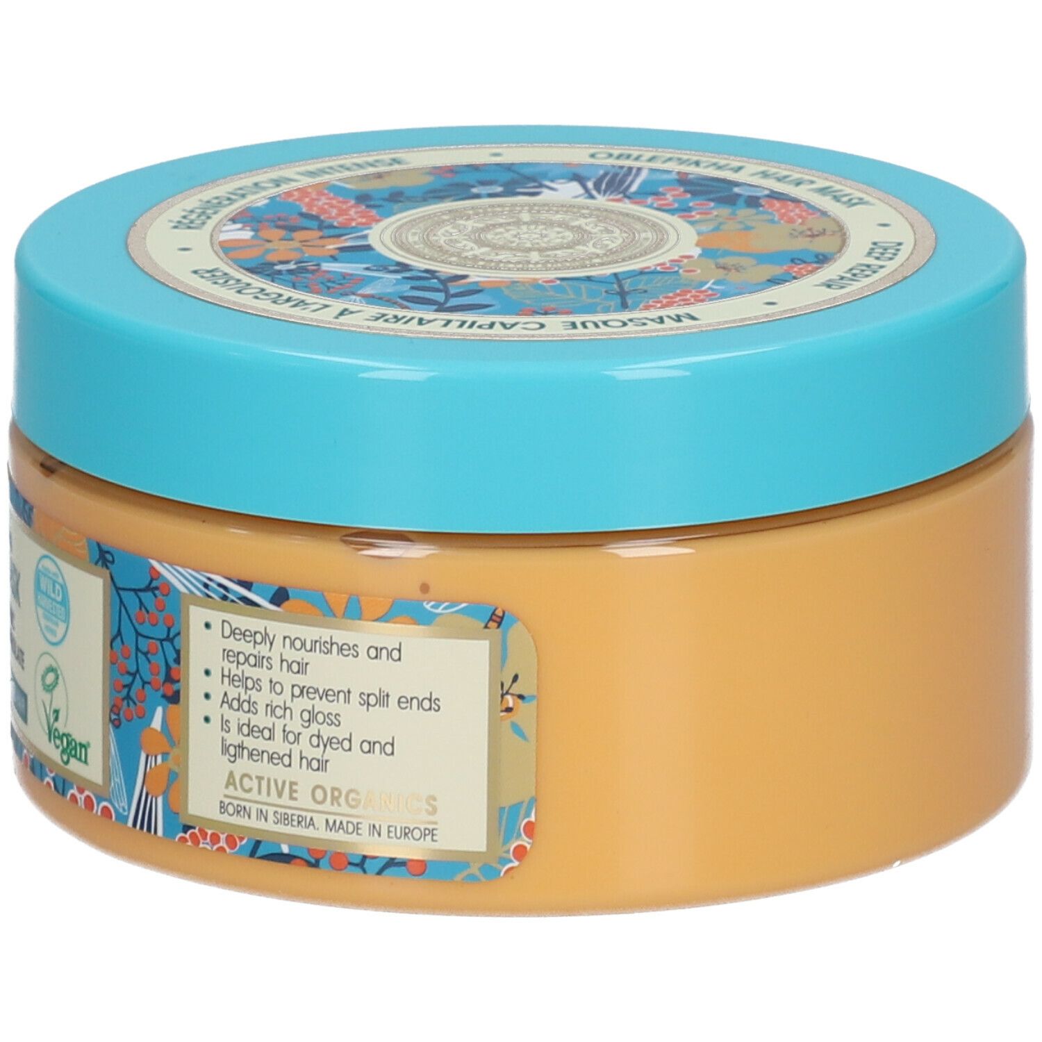 Haarmasker met blauw deksel. Opschrift: Masque capillaire à l'argousier. Tekst over voordelen. Vegan-zegel.