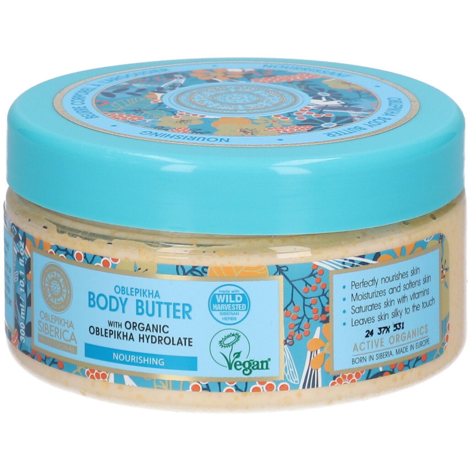 Pot rond avec couvercle bleu. Inscription : Body Butter, Oblepikha Siberica. Label Vegan. 300 ml.