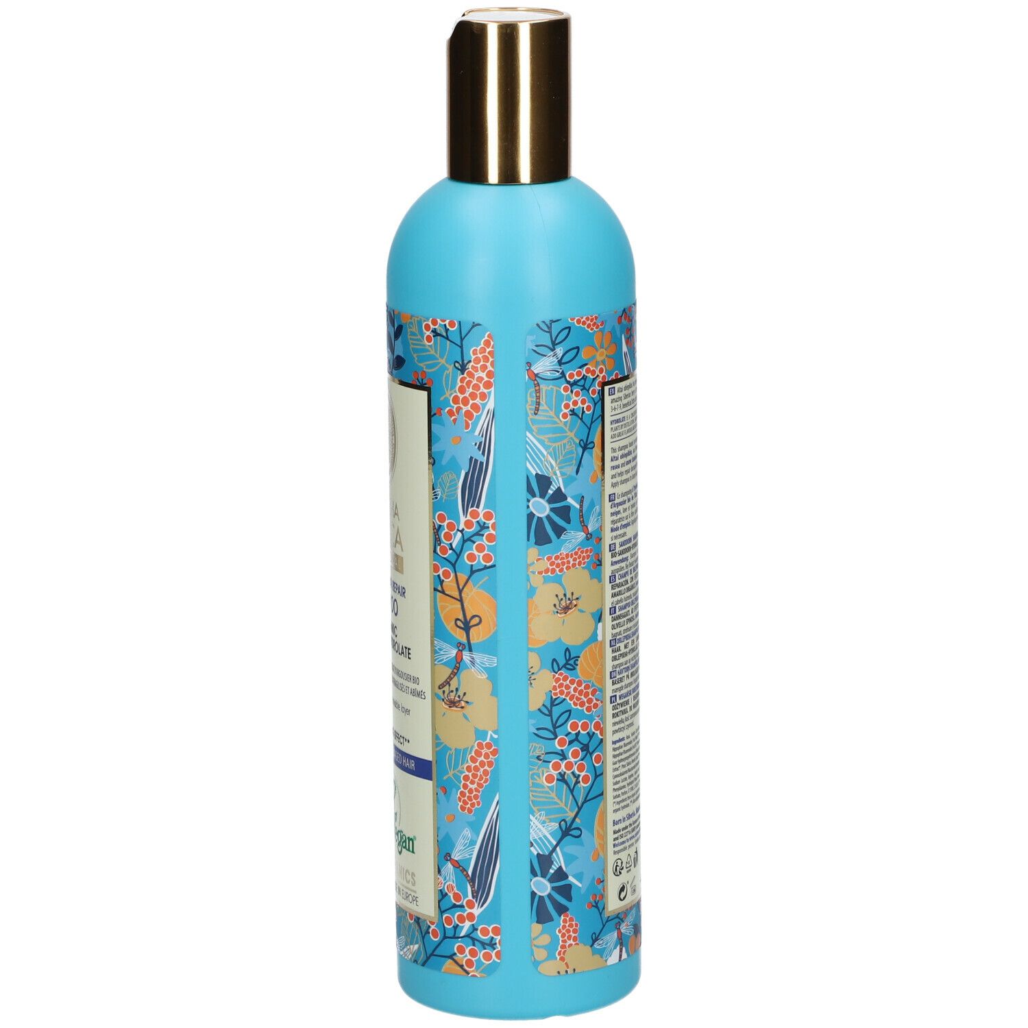 Lichtblauwe fles met bloemenpatroon en gouden dop. Achterkant met productinformatie.