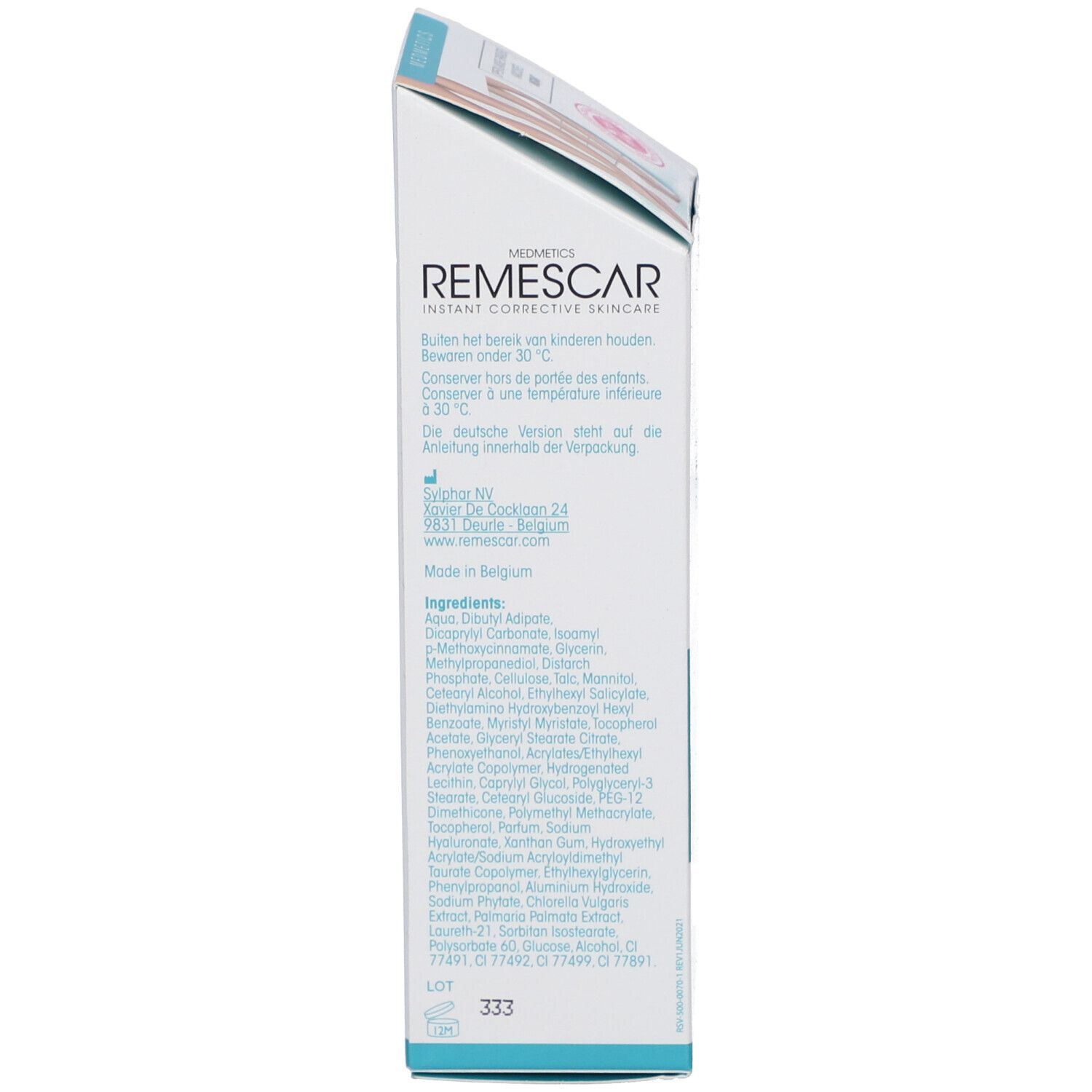 Zijaanzicht van de verpakking. Opschrift: REMESCAR, ingrediëntenlijst, 40 ml.