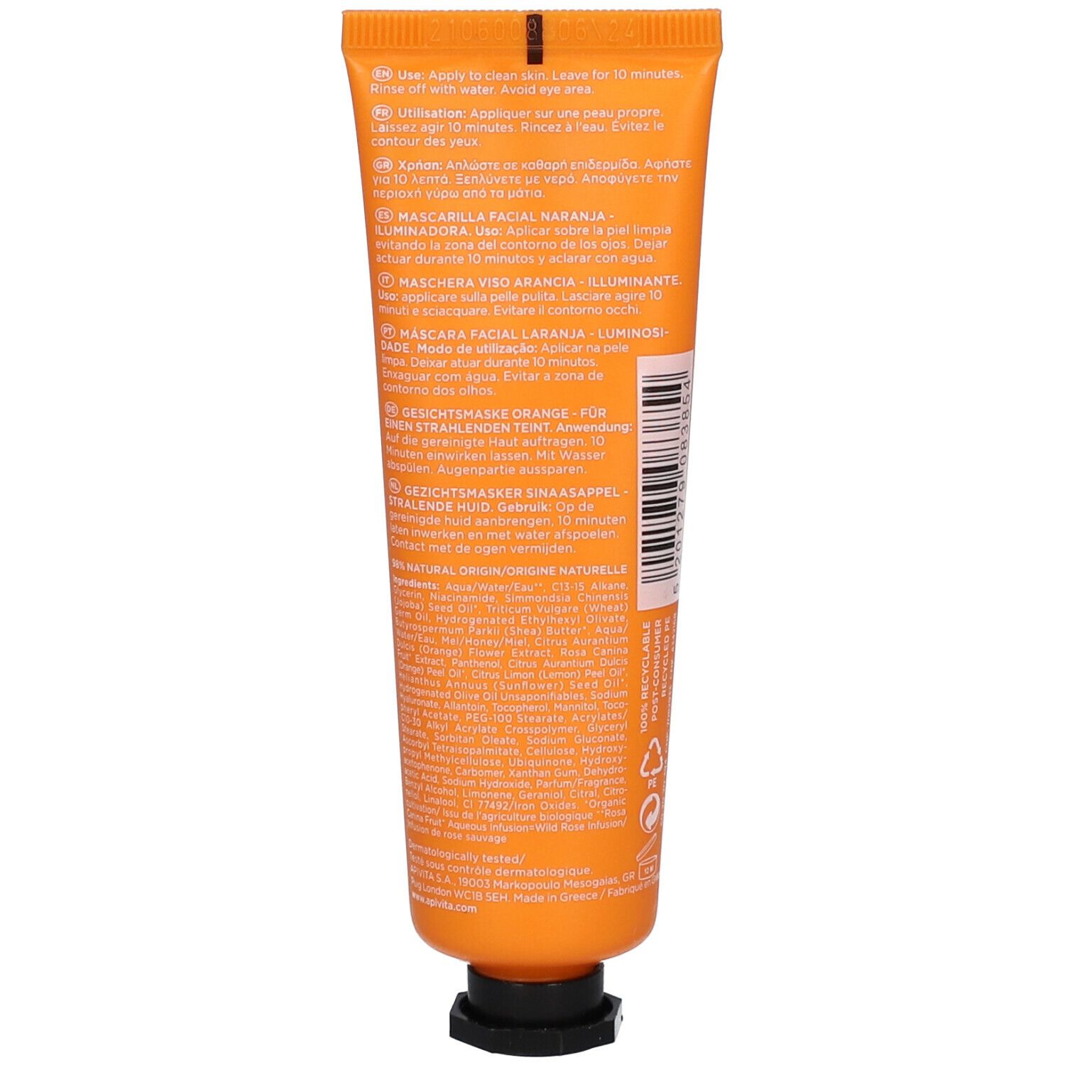 Achterkant van de oranje tube met tekst in verschillende talen. Zwarte sluiting.