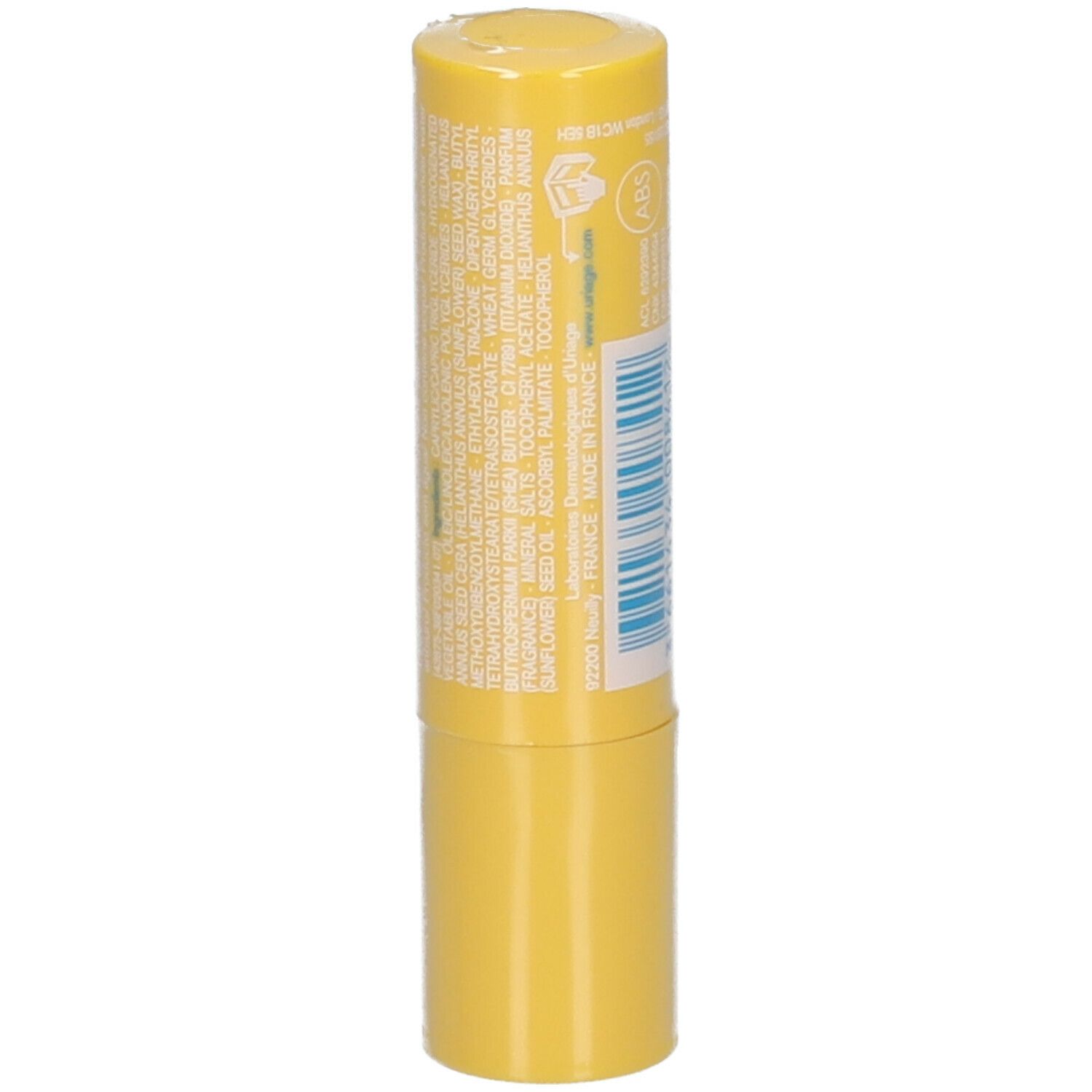 Achterkant van gele lippenbalsem. Tekst en barcode. Ingrediënten. Merk URIAGE.