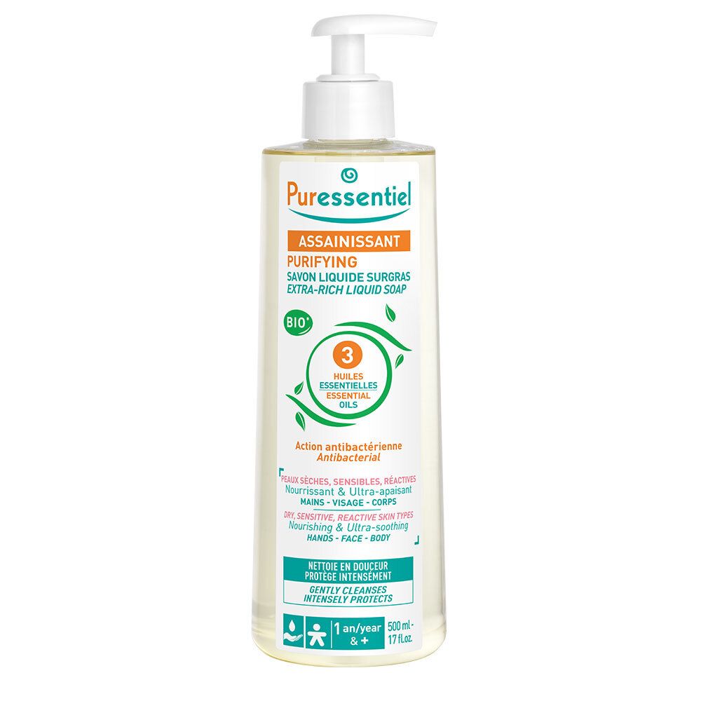 Savon liquide avec pompe. Inscription: Purifying, 3 huiles essentielles, Bio. Pour peaux sensibles.