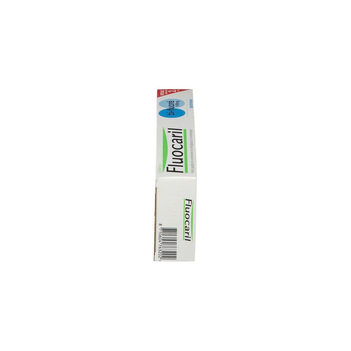 Emballage de dentifrice, vue latérale. Emballage avec inscriptions bleues et vertes. Inscription: Fluocaril.