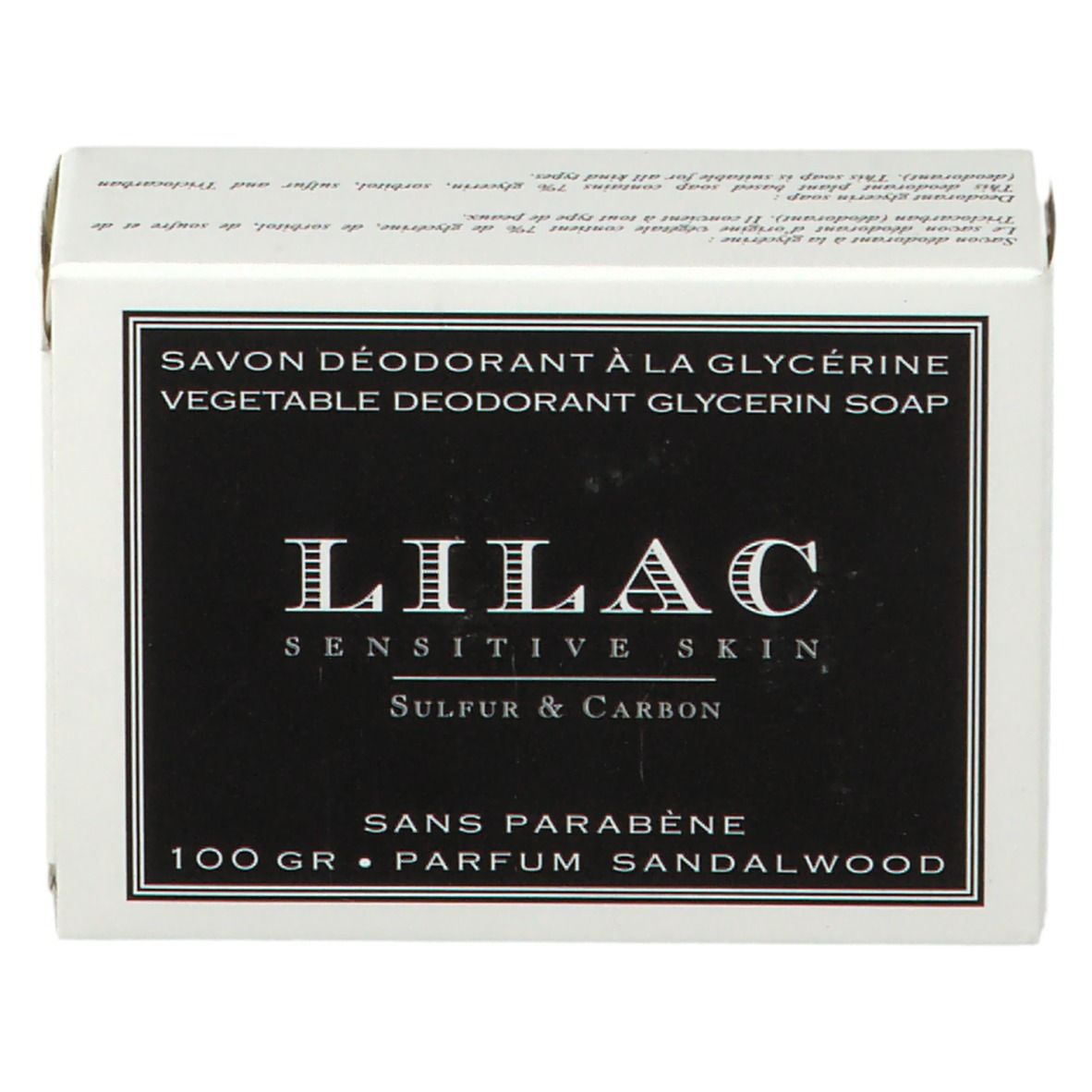 Witte doos met zwart etiket. Opschrift: LILAC Sensitive Skin, Sulfur & Carbon. Tekst: Sans Parabène, Parfum Sandalwood. 100 gr.