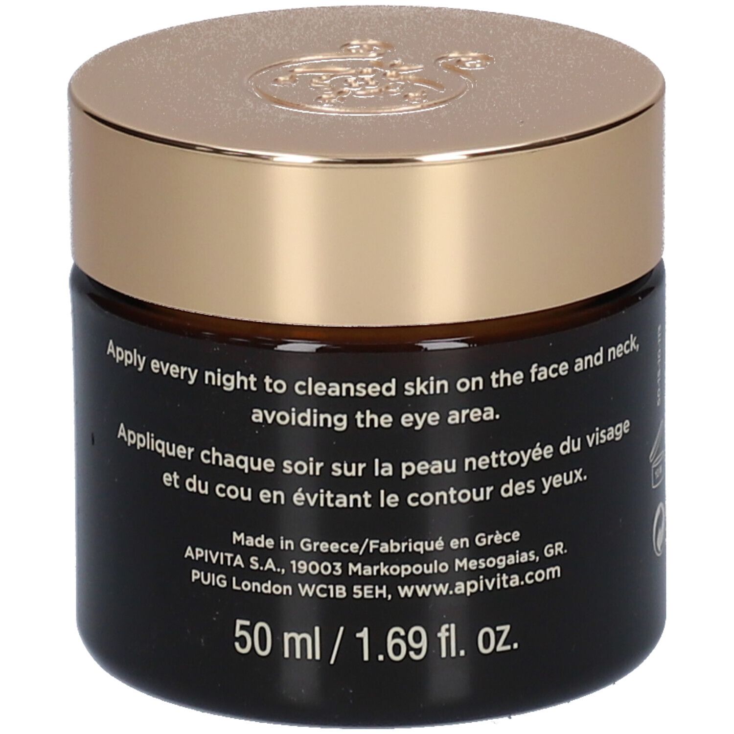Dunkle Creme-Dose mit goldenem Deckel. Text: Anwendung abends auf gereinigter Haut. 50 ml.