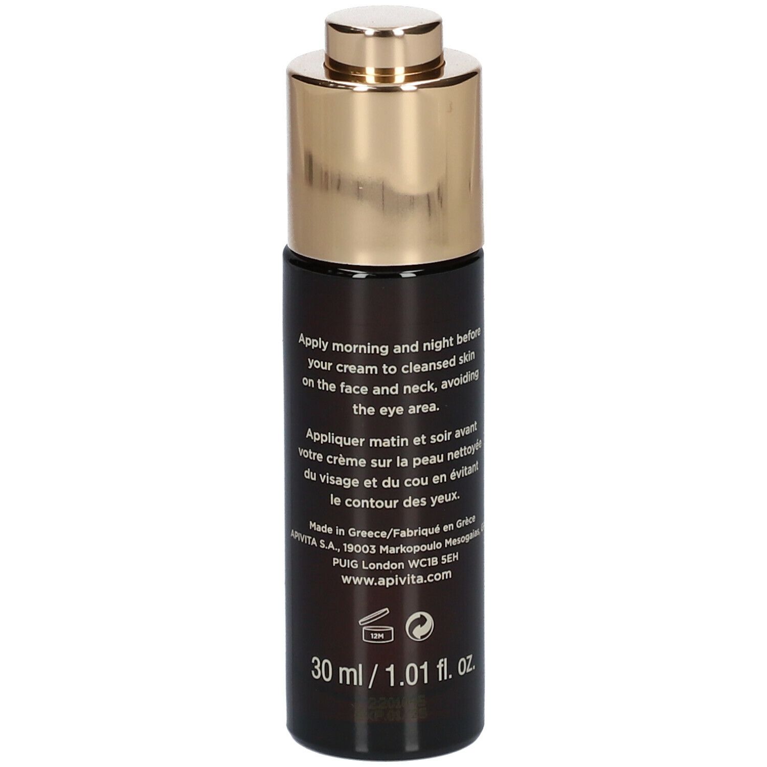 Donkere fles met gouden dop. Tekst op de achterkant. Opschrift: 30 ml / 1.01 fl. oz.