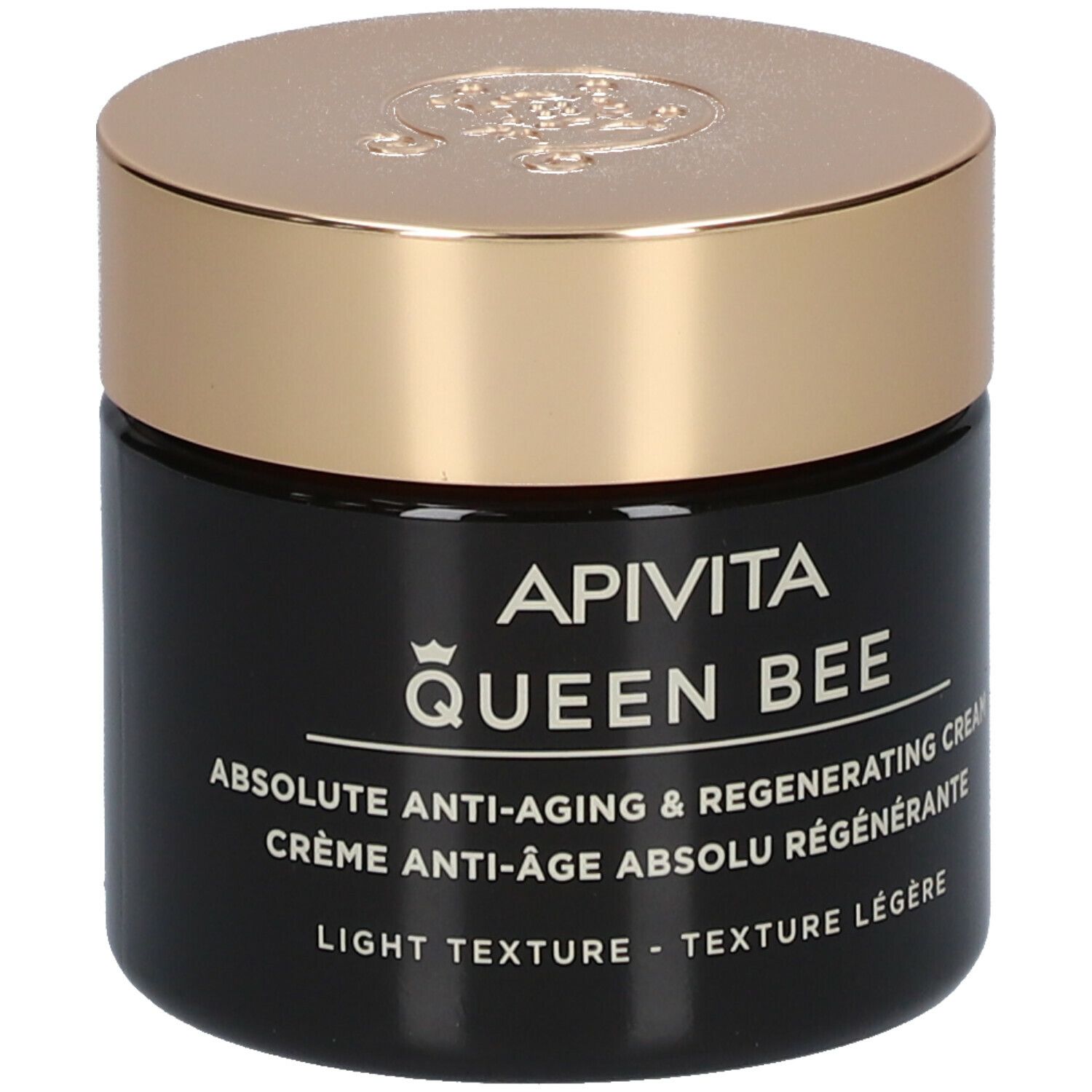 Donkere crème pot met gouden deksel. Opschrift: APIVITA Queen Bee Absolute Anti-Aging Creme Regenerierend - Lichte textuur.