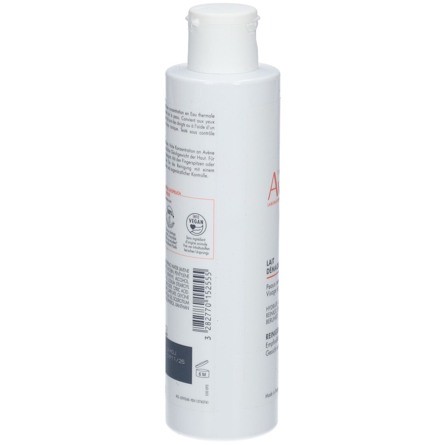 Witte fles met tekst. Bevat reinigingsmelk. Opschrift: Avène. Vegan-label en andere certificeringen.