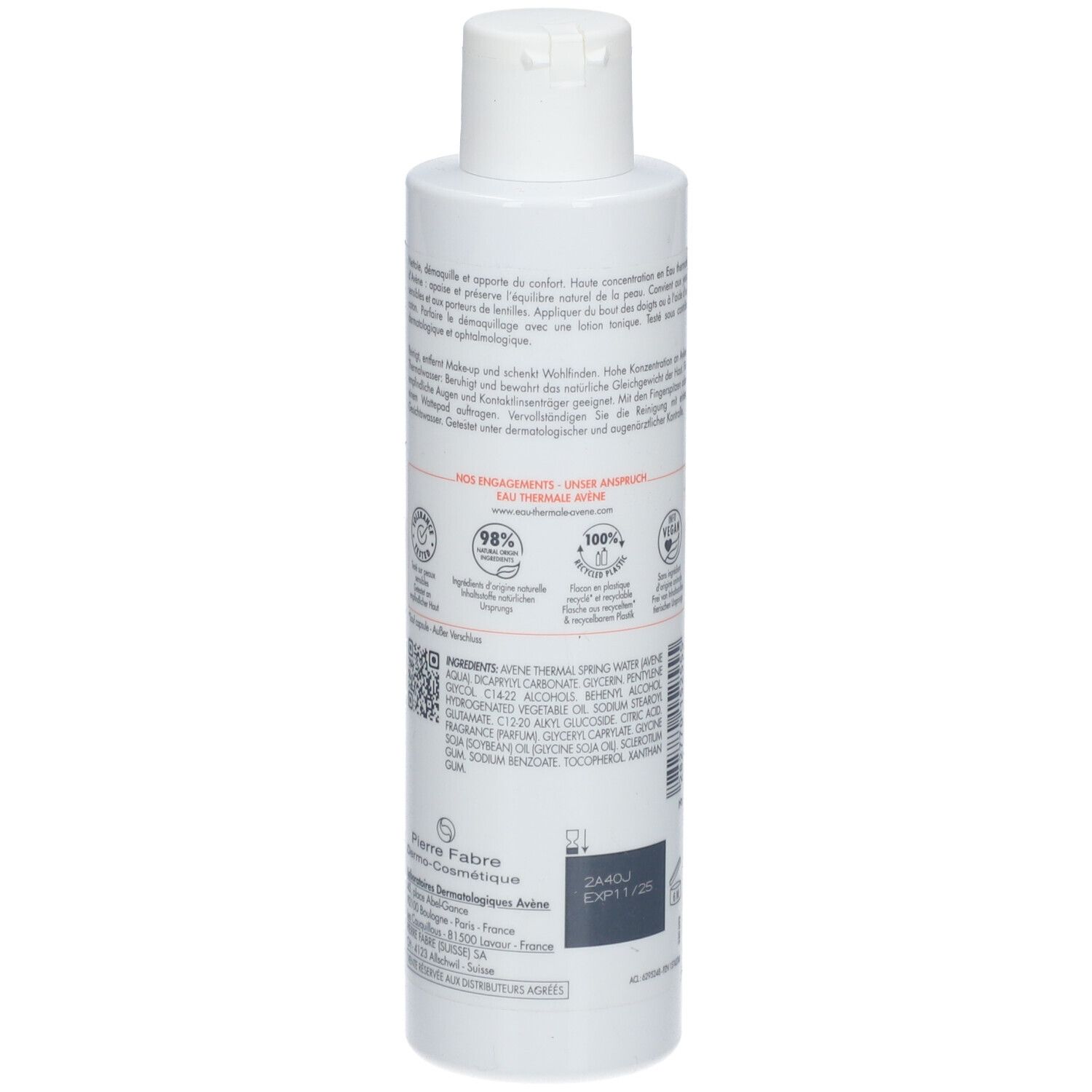 Witte fles met tekst. Bevat reinigingsmelk. Opschrift: Avène. Vegan-label en andere certificeringen.