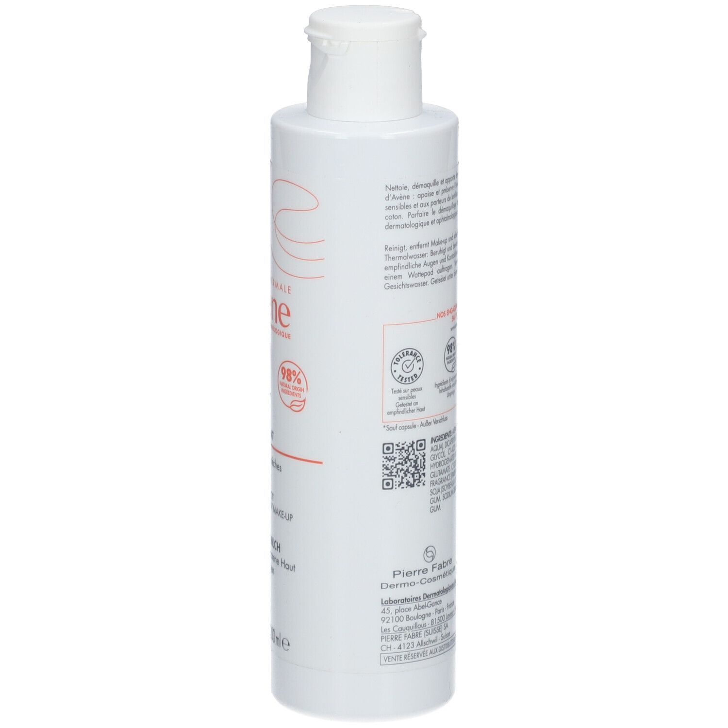 Witte fles met tekst. Bevat reinigingsmelk. Opschrift: Avène. Vegan-label en andere certificeringen.