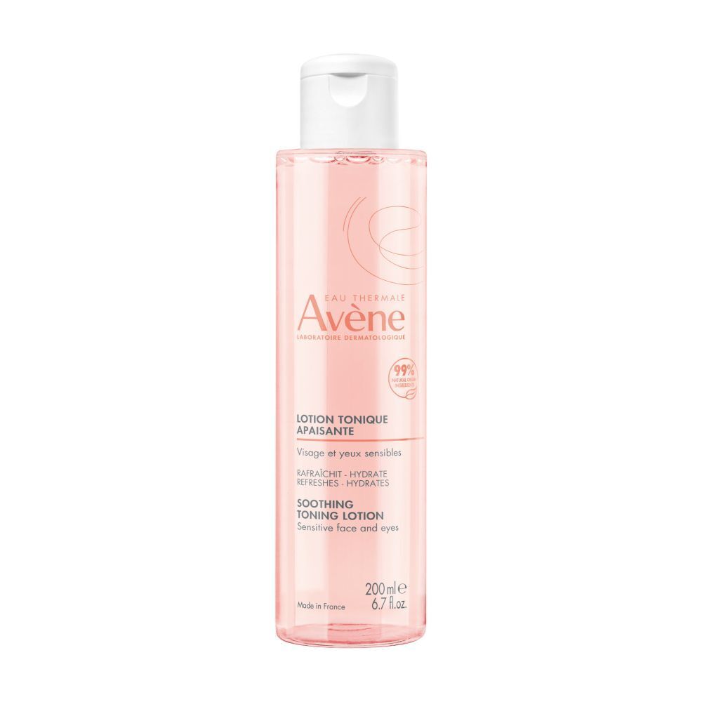 Flacon rose avec bouchon blanc. Inscription: Avène Eau Thermale, Lotion Tonique Apaisante. Pour visage et yeux sensibles.