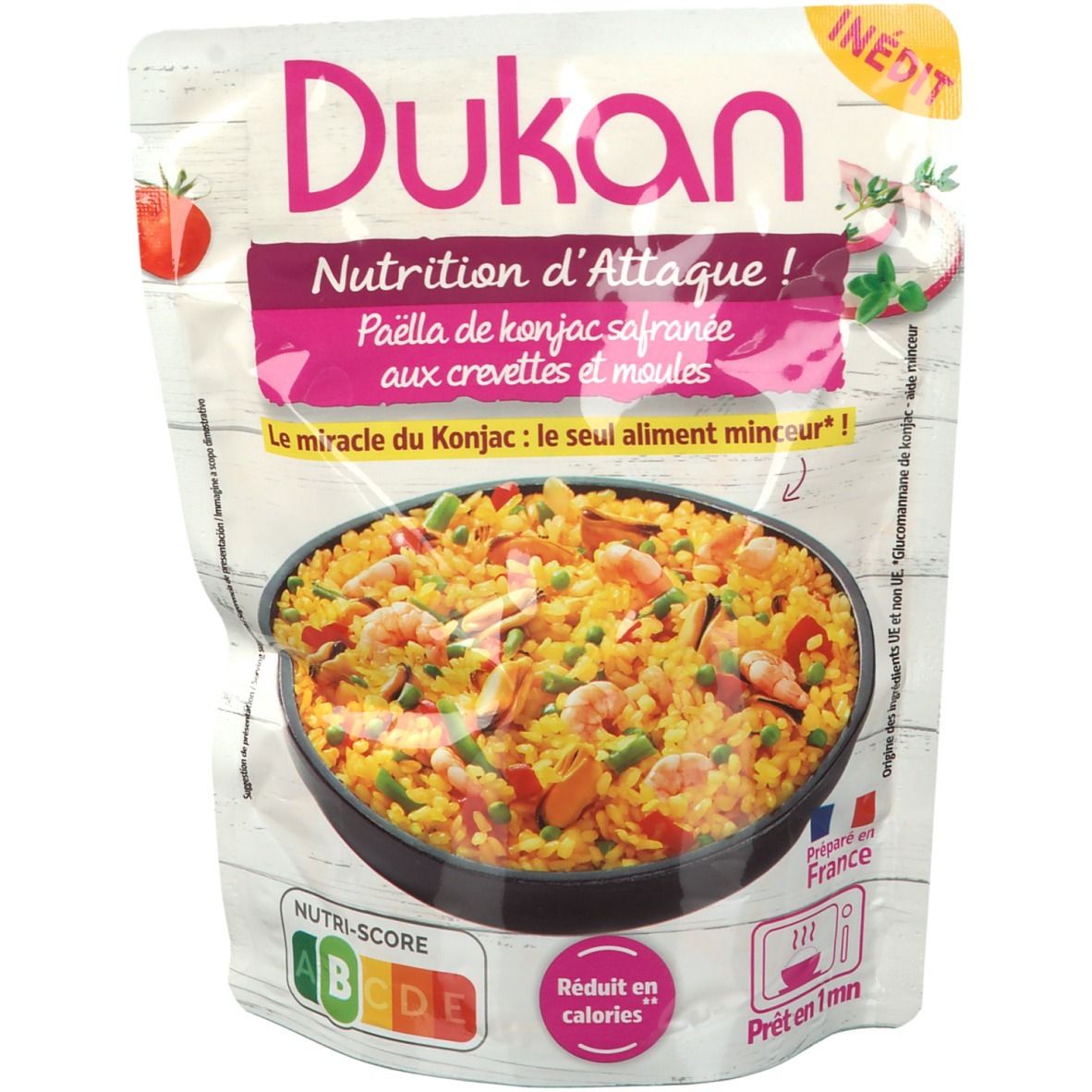 Verpakking Dukan Konjak-Paella. Opschrift: Nutrition d'Attaque! Paella met saffraan, garnalen en mosselen. Nutri-Score label.