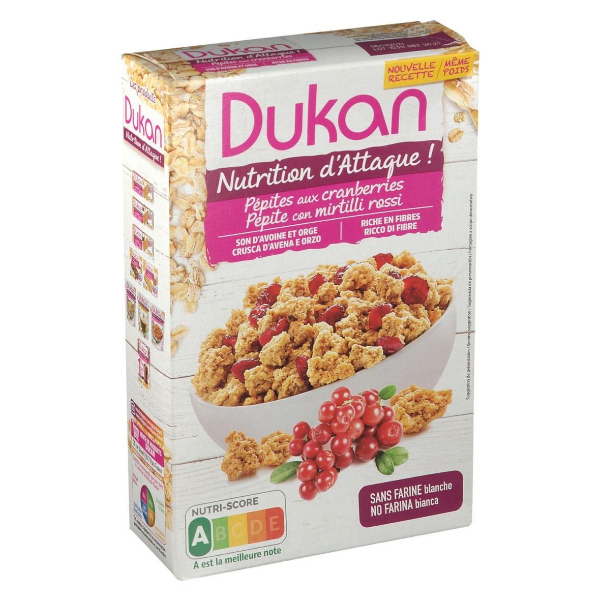 Dukan-Verpackung mit Cranberry-Pépites. Text: Nutrition d'Attaque, ohne Weizenmehl. Enthält eine Schüssel mit Müsli und Cranberries.