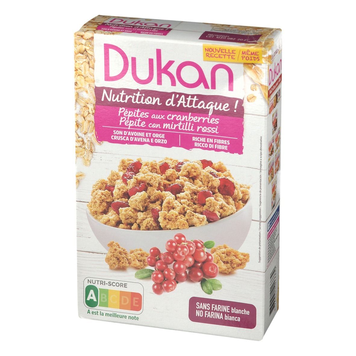 Dukan-Verpackung mit Cranberry-Pépites. Text: Nutrition d'Attaque, ohne Weizenmehl. Enthält eine Schüssel mit Müsli und Cranberries.