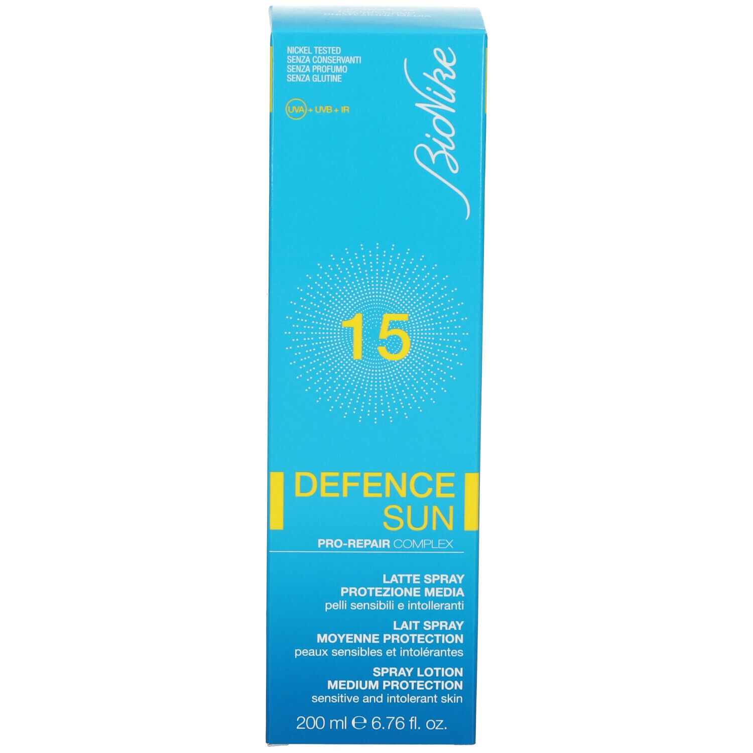 Turkooisblauwe doos. Opschrift: BioNike, DEFENCE SUN, 15, Lait Spray, 200 ml.