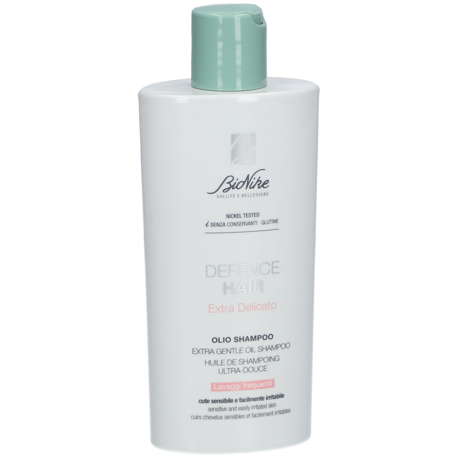 BioNike DEFENCE HAIR Shampoo-Flasche, weiß mit grünem Deckel. Text: Extra Delicato, Olio Shampoo.