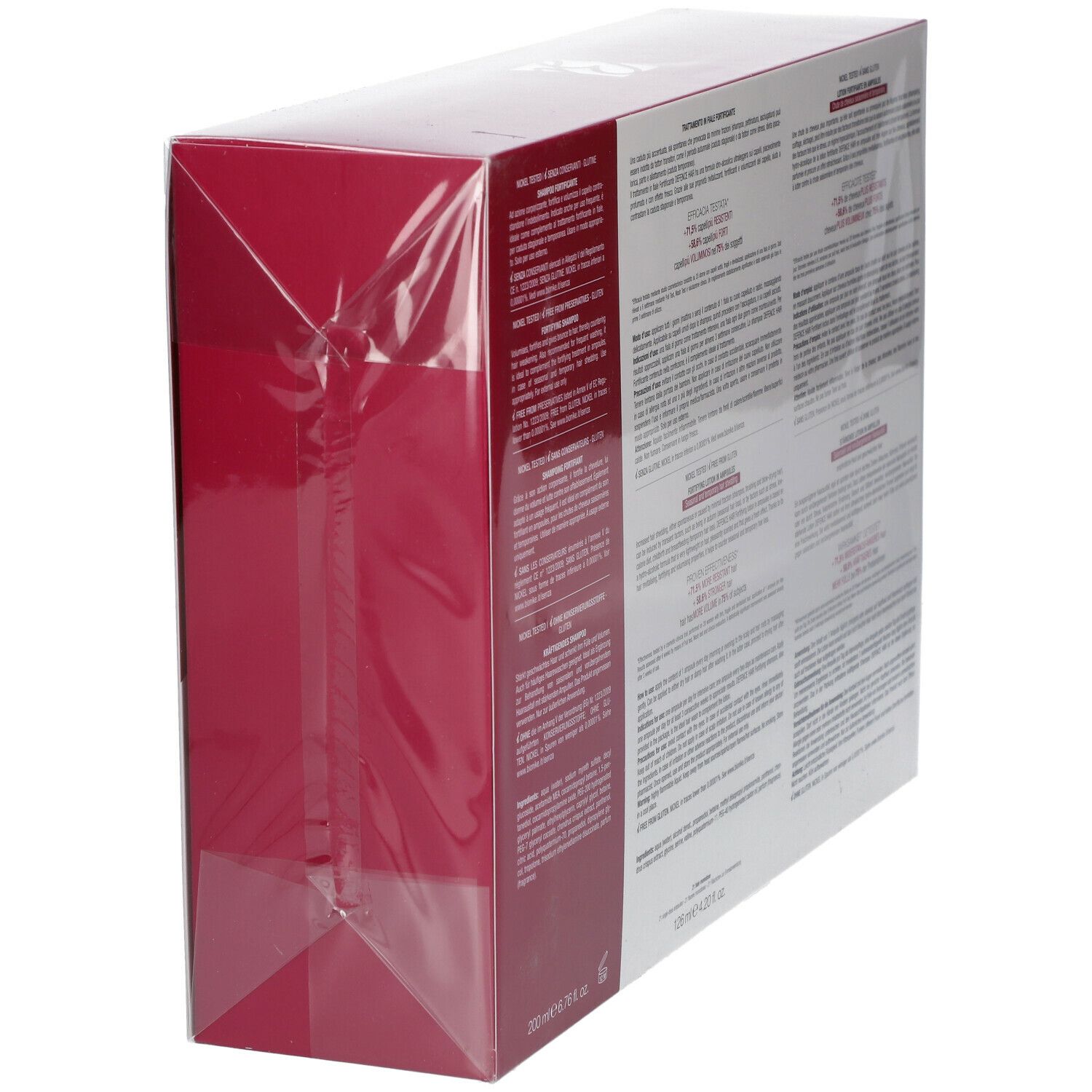 Vue latérale du coffret cadeau. Emballage rouge et blanc avec texte. Contient des informations sur le produit.