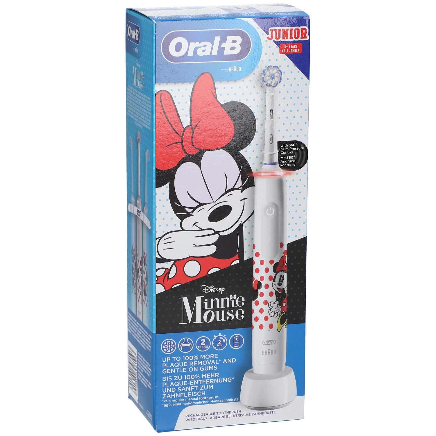 Elektrische tandenborstel Minnie Mouse in verpakking. Oral-B Junior, wit, met oplaadstation. Opschriften: Disney, Oral-B.