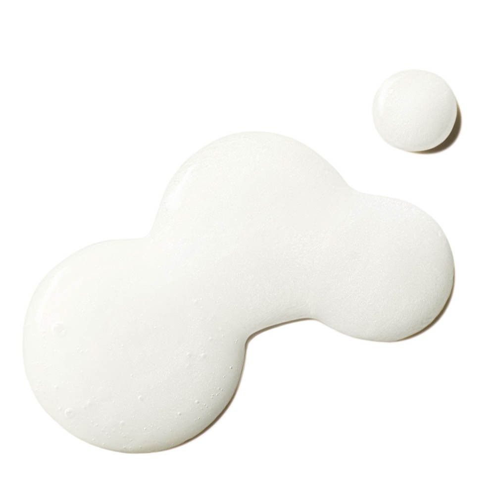 Texture de sérum blanc. Deux gouttes. Sur fond clair.