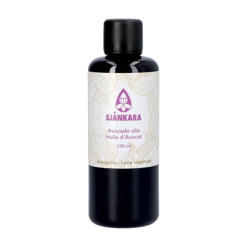 Flacon avec bouchon noir. Étiquette avec nom du produit: Avocado olie. 100 ml.