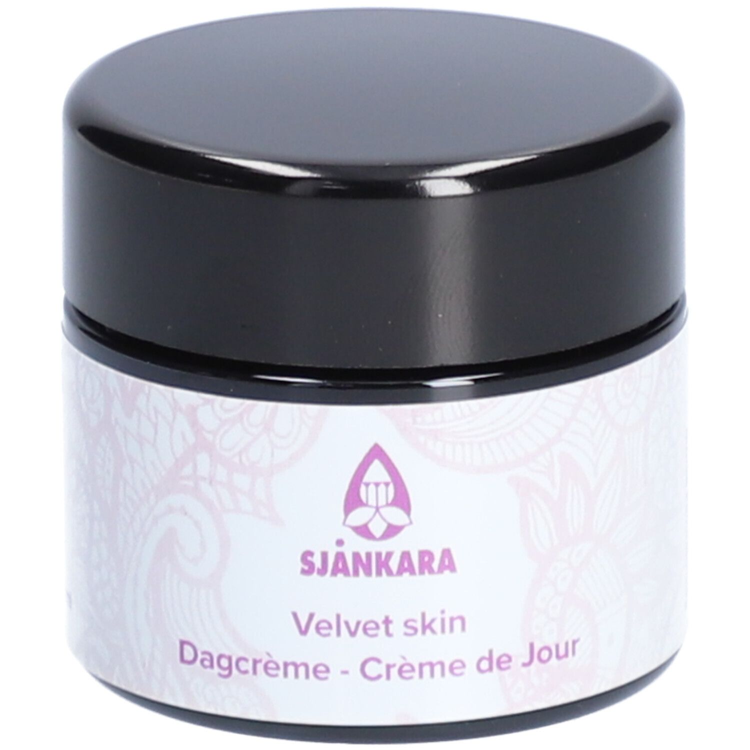 Pot de crème avec couvercle noir. Étiquette avec logo et texte: Velvet skin, Dagcrème - Crème de Jour.