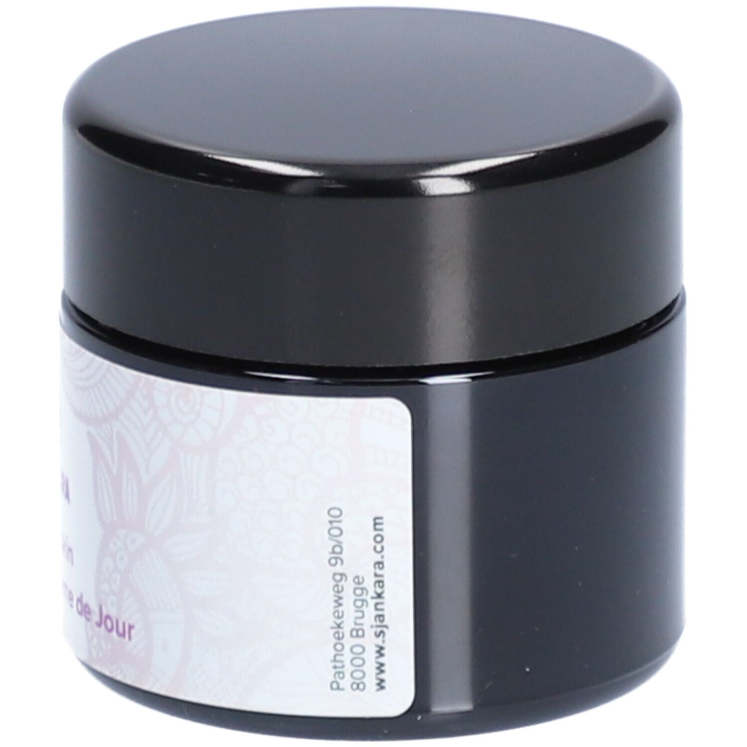 Pot de crème avec couvercle noir. Étiquette avec logo, texte et adresse. Texte: Velvet skin, Dagcrème - Crème de Jour.