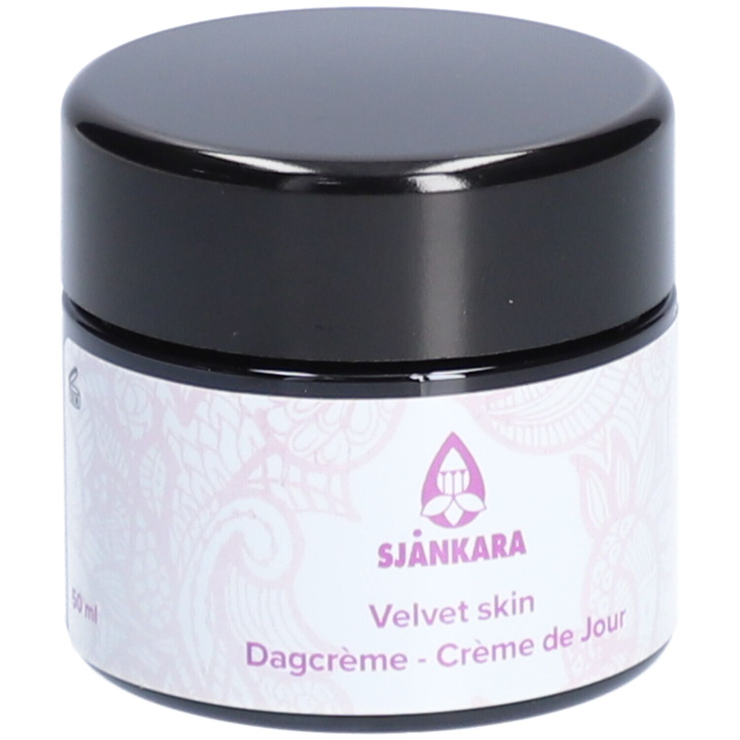 Pot de crème avec couvercle noir. Étiquette avec logo, texte et 50 ml. Texte: Velvet skin, Dagcrème - Crème de Jour.
