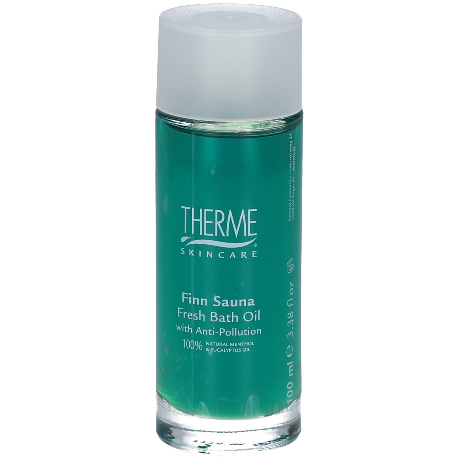 Cilindrische fles met groene vloeistof en witte dop. Opschrift: Therme, Finn Sauna Fresh Bath Oil.