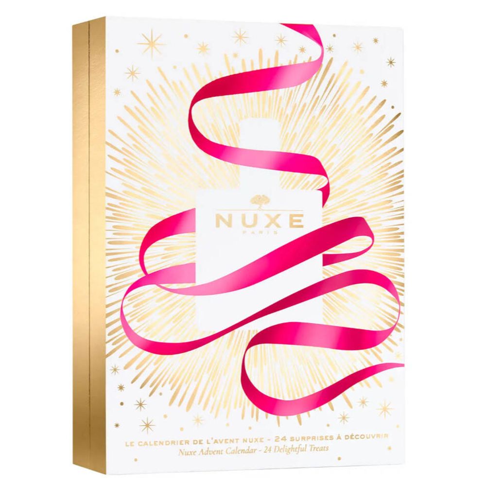 Adventskalender mit goldfarbenen Sternen und rosa Schleife. NUXE-Logo auf weißem Feld.