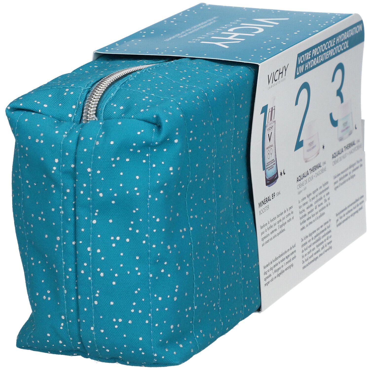 Cadeauset met toilettas en verpakking. Vichy-logo en productnamen zichtbaar. Blauwe tas met witte stippen, ritssluiting.
