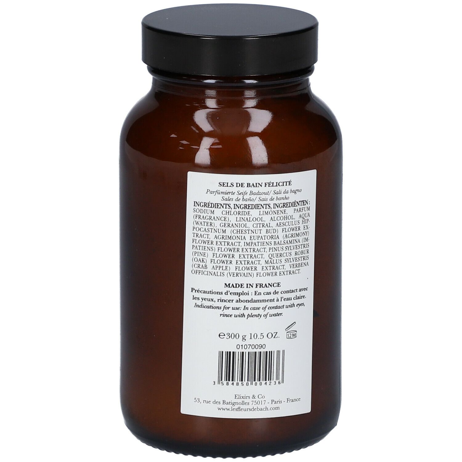 Braune Glasflasche mit schwarzem Deckel. Etikett mit Inhaltsstoffen und Text in Französisch. Rückansicht.