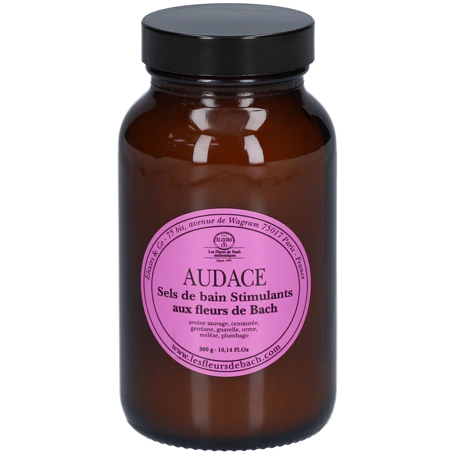 Bruine glazen fles met zwarte dop. Roze etiket met tekst: AUDACE Sels de bain Stimulants aux fleurs de Bach.