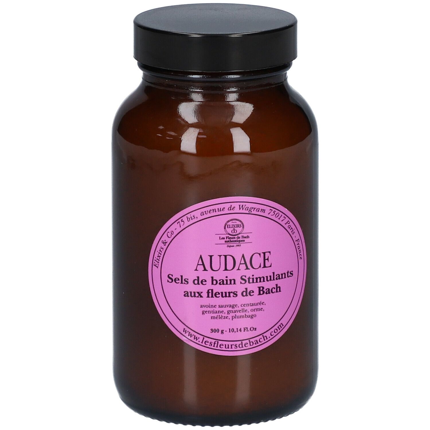 Bruine glazen fles met zwarte dop. Roze etiket met tekst: AUDACE Sels de bain Stimulants aux fleurs de Bach.