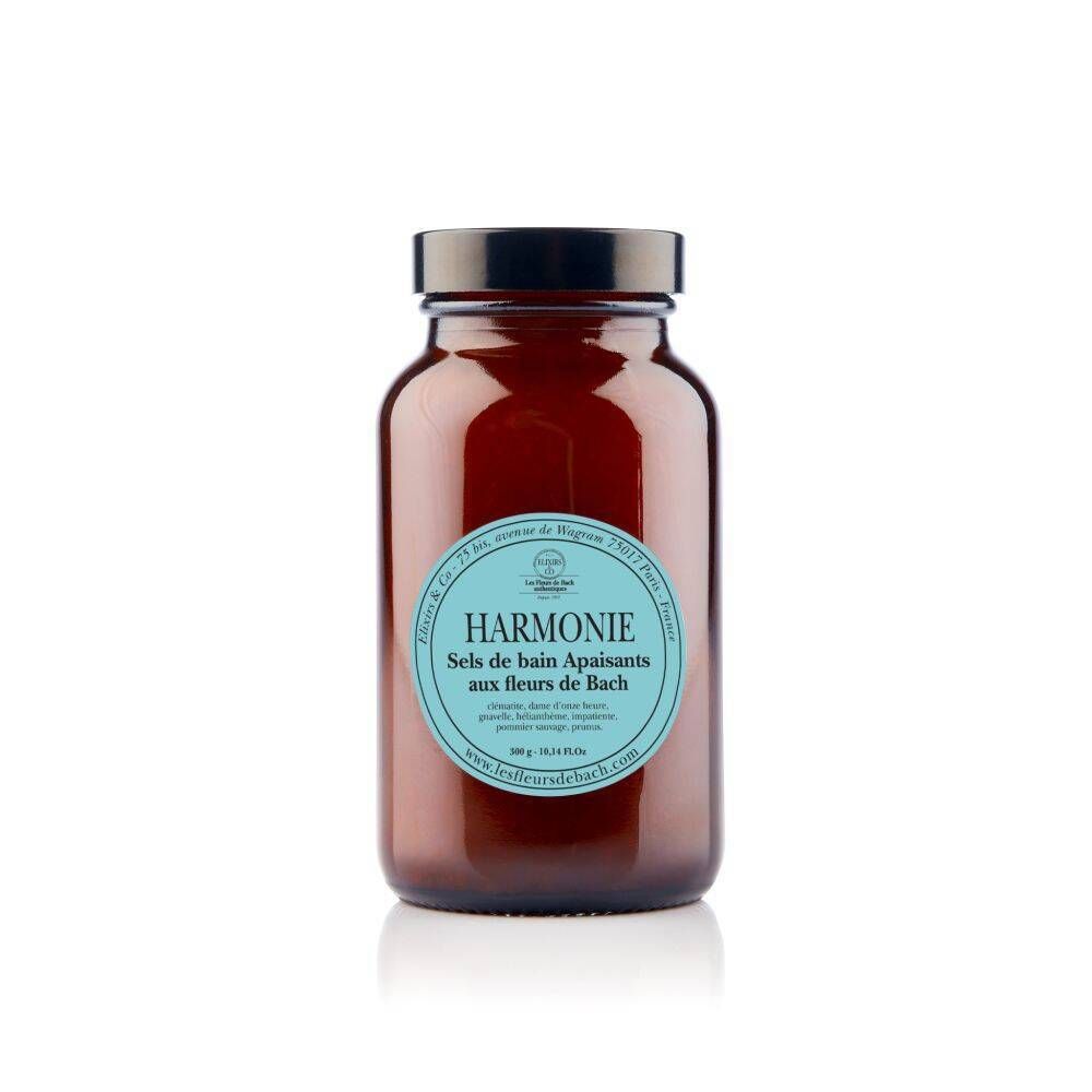 Bruine glazen fles met zwarte dop. Blauw etiket met tekst: Harmonie, Sels de bain Apaisants aux fleurs de Bach.
