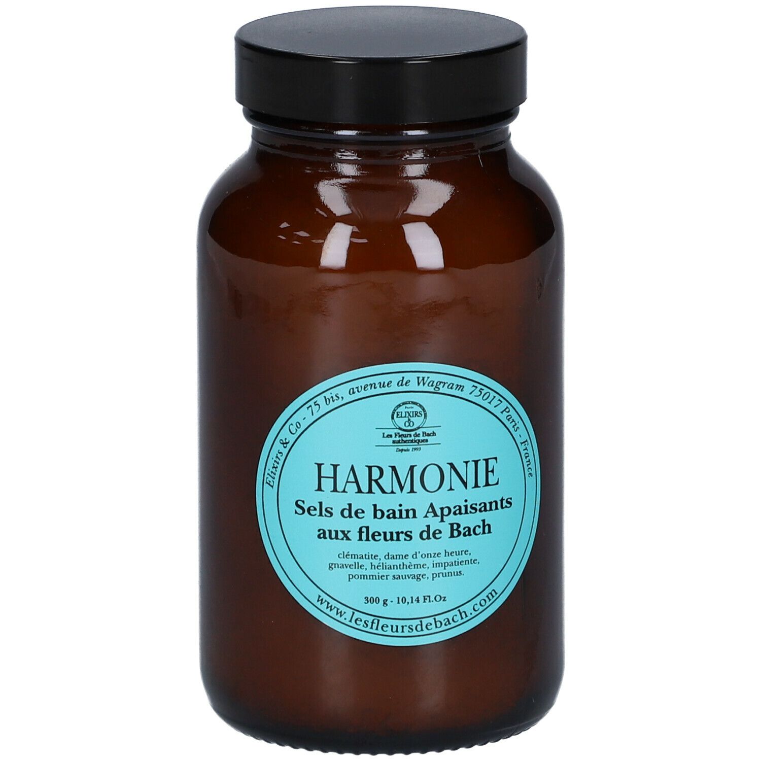 Bruine glazen fles met zwarte dop. Blauw etiket met tekst: Harmonie, Sels de bain Apaisants aux fleurs de Bach.