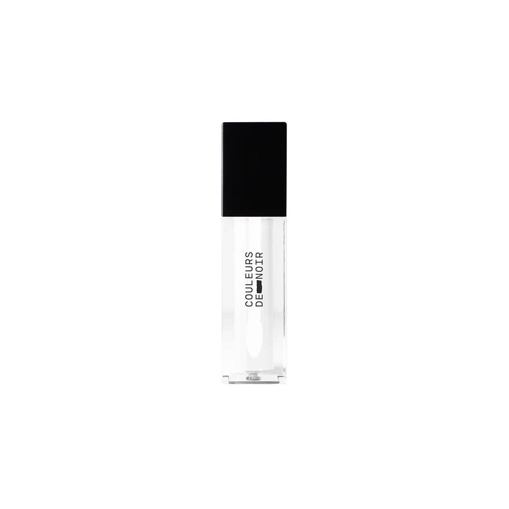 Lipgloss tube met zwarte dop. Opschrift: LES COULEURS DE NOIR.